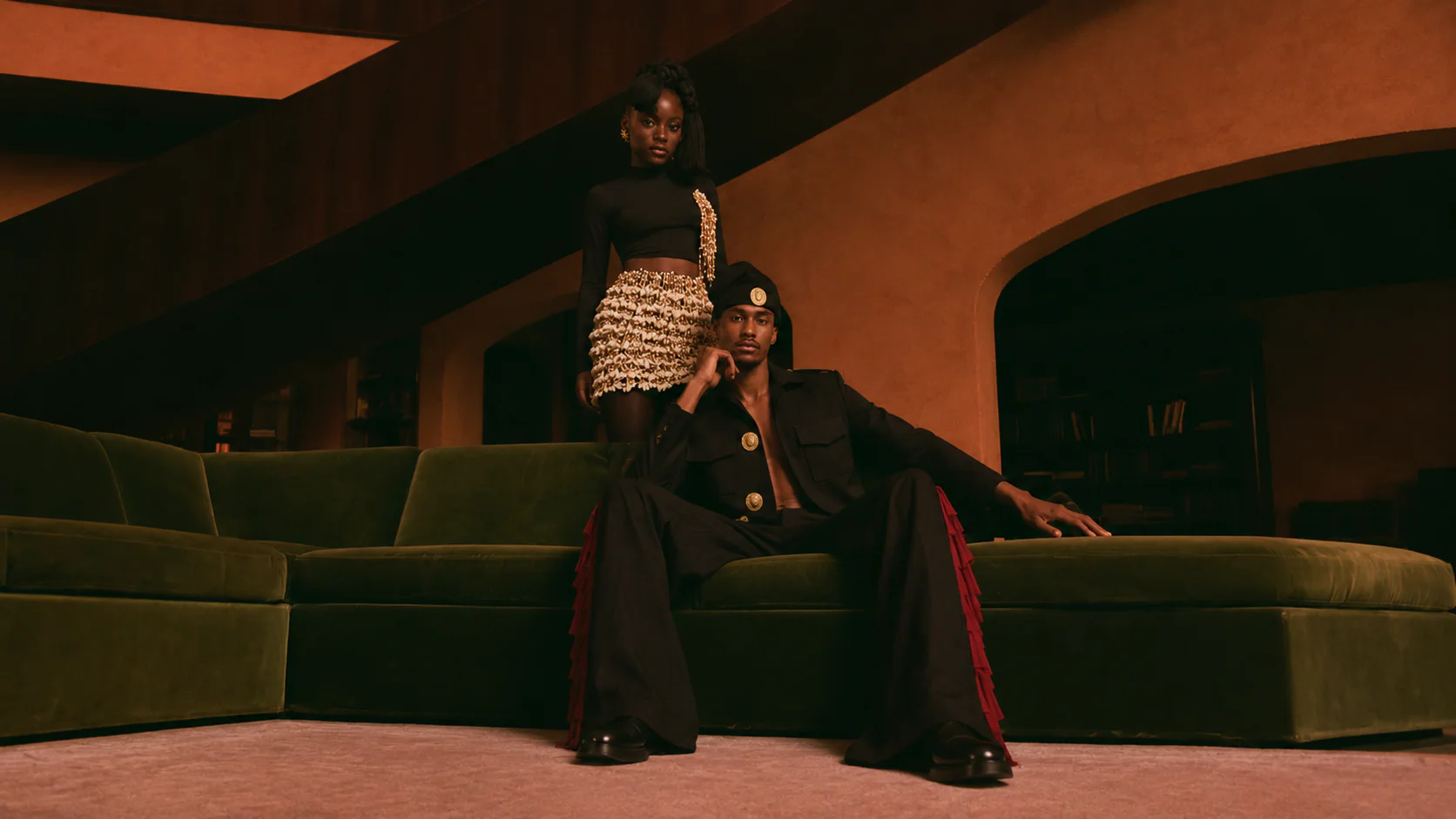 Obiageri tailoring photographed in an intimate heritage interior